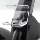 Base Carregador Ps4 preta com conector USB-C prateado e suporte transparente.