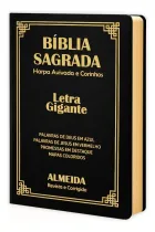 Biblia Sagrada preta com capa dura, letras e detalhes dourados, laterais douradas