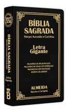 Biblia Sagrada preta com capa dura, letras douradas e harpa avivada.
