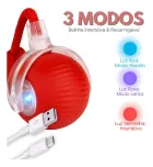 Bola Inteligente vermelha com anel transparente, luz azul, cordão vermelho e cabo USB.