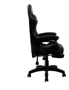 Cadeira Gamer preta com apoio de braço e pés, vista lateral