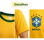 Camiseta Brasil amarela com gola verde e escudo CBF azul