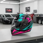 Capacete Ebf New Spark preto, rosa e azul-turquesa com gráficos e viseira transparente.