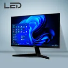 Monitor preto com tela ligada exibindo interface Windows 11 azul