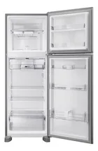 Geladeira Brastemp inox aberta, interior branco com prateleiras e gavetas transparentes.