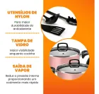 Duas panelas antiaderente rosa com tampas de vidro e utensílios de nylon pretos