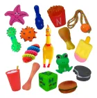 Vários Brinquedos Mordedor Pet coloridos, incluindo frango, batata frita, osso e sapo.