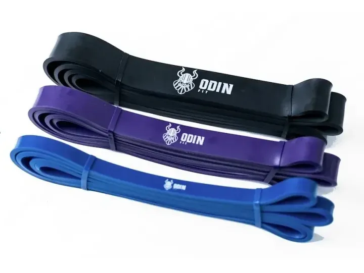 Três Super Bands Odin Fit nas cores preta, roxa e azul.