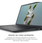 Notebook Dell Inspiron preto aberto com tela exibindo mão de musgo verde